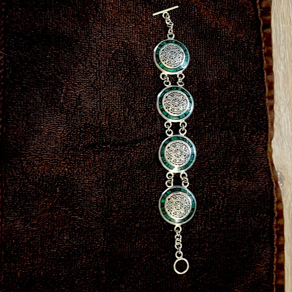 Silver Mexican sun dial with inlay bracelet